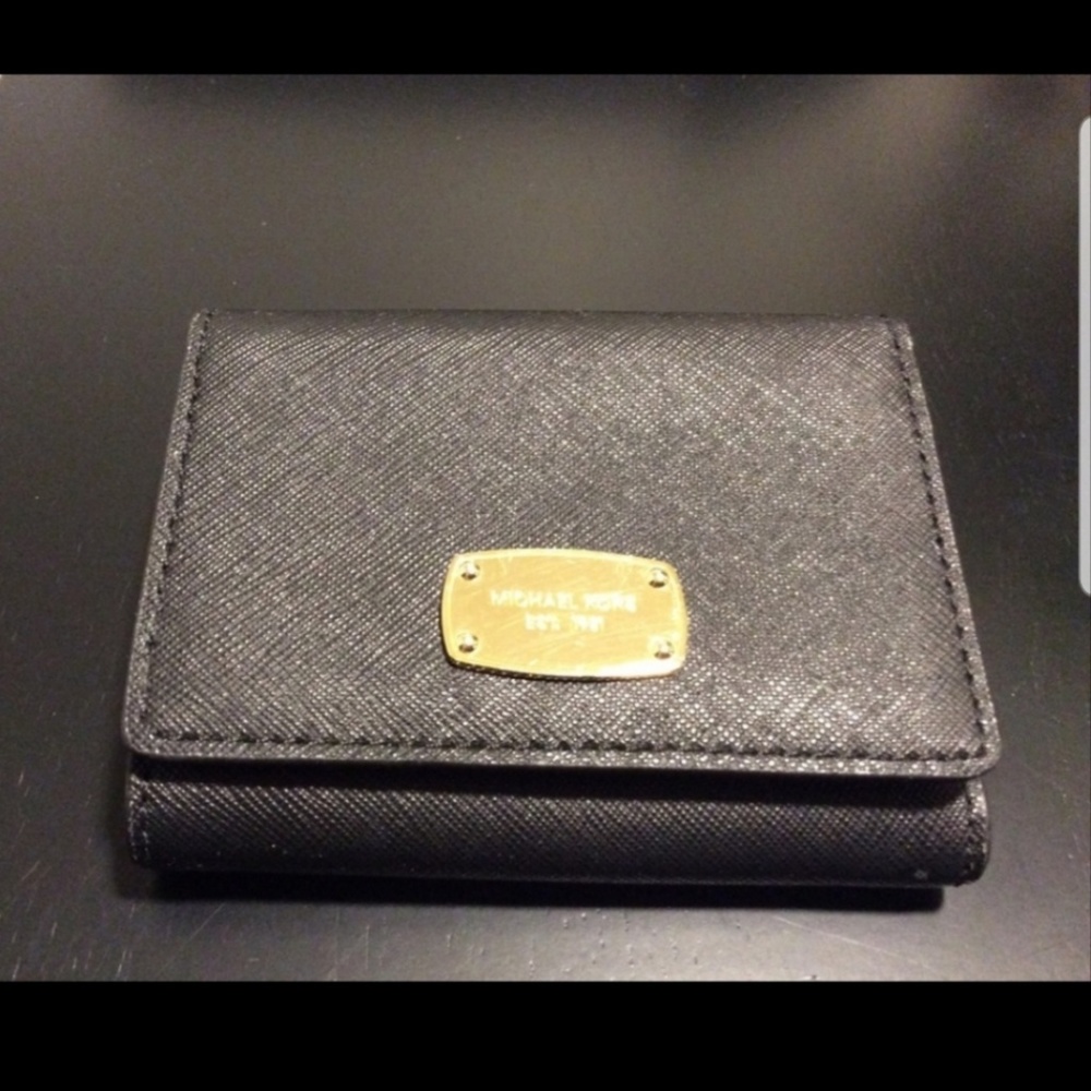 Like new Michael Kors leather tri fold wallet